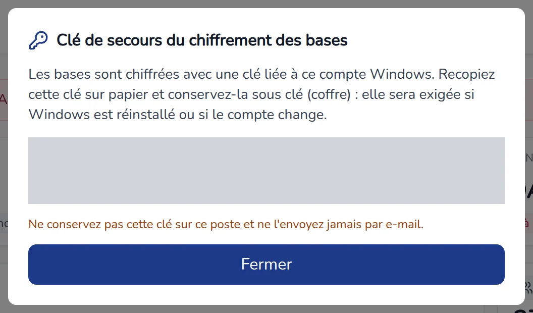 Fenêtre Clé de secours du chiffrement des bases, la clé masquée sur la capture
